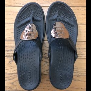 Croc flip flop with stylish silver circular design